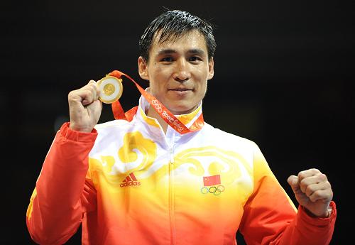 Chinese Zhang Xiaoping beats Ireland's Kenny Egan to win the Olympic light weight (81kg) gold medal on Sunday.