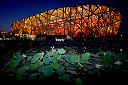 Photo taken on Aug. 22, 2008 shows the nightscape of the National Stadium, also known as the Bird&apos;s Nest, in Beijing, capital of China. The Olympic Green enjoys a beautiful night view shining with colors and lights during the Beijing 2008 Olympic Games.