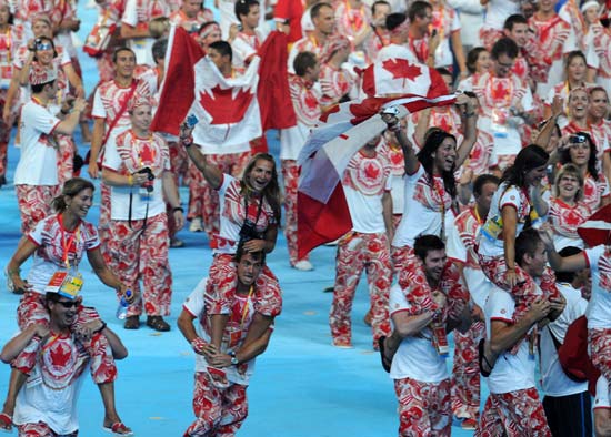 Members of the Canadian Olympic Delegation enter the National Stadium, or the Bird's Nest, during the Beijing 2008 Olympic Games closing ceremony in Beijing, capital of China, on Aug. 24, 2008. (Xinhua/Yang Lei) 