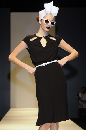 A model presents the creation by Argentine designer Ramirez during the Buenos Aires Fashion Week, Argentina, Aug. 20, 2008. Over 40 shows were held during the fashion week which closed on Aug. 23.