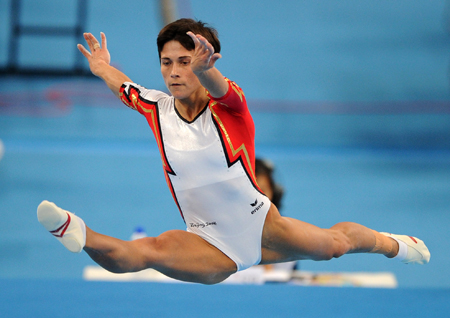 O. Chusovitina of Germany performs on the floor during the gymnastics artistic women's qualification of Beijing 2008 Olympic Games at National Indoor Stadium in Beijing, China, Aug. 10, 2008.