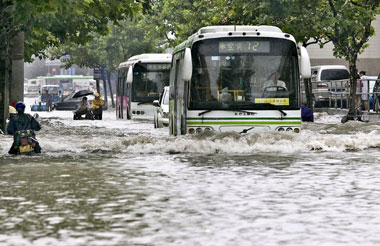 130-year record rain puts Shanghai in slow lane