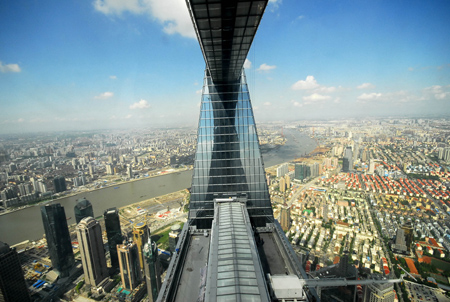 A view of the city of Shanghai from the 492-meter-tall Shanghai World Financial Center under construction on August 26, 2008. [CFP] 