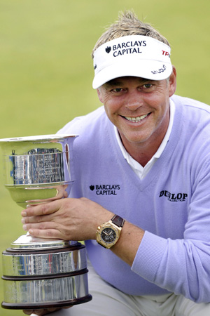 Northern Ireland's Darren Clarke poses with the trophy after his victory at the KLM Open Golf Tournament in Zandvoort, August 24, 2008.