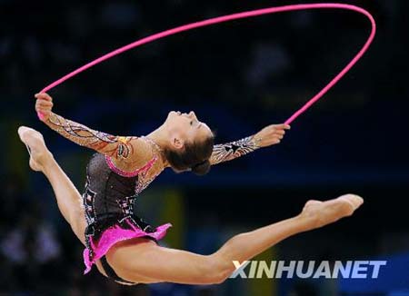 Evgeniya Kanaeva of Russia competes during the individual all-round final at the Beijing 2008 Olympic Games rhythmic gymnastics event in Beijing, China, Aug. 23, 2008. Evgeniya Kanaeva won the gold medal of the event. 