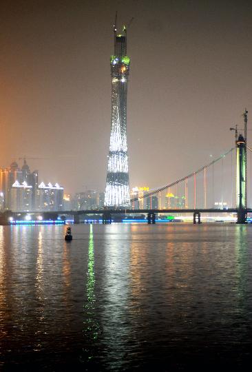 The 454-meter main section of Guangzhou's new TV tower was completed on August 27 after 26 months of construction work. [Lu Hanxin/Xinhua]