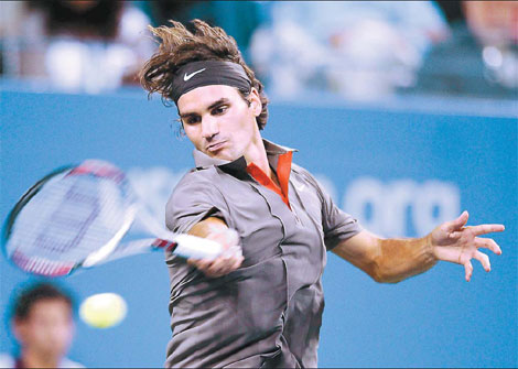 Roger Federer of Switzerland hits a return to Maximo Gonzalez of Argentina during their match at the US Open tennis tournament in Flushing Meadows, New York on Tuesday. Federer won the match 6-3, 6-0, 6-3. 