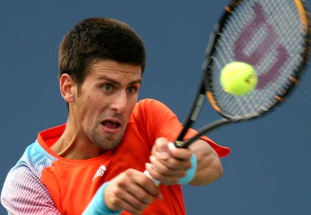  Novak Djokovic of Serbia acts against Arnaud Clement of France during the first round competition of men's singles at US Open tennis in New York, Aug. 27, 2008. Novak Djokovic beat Arnaud Clement 6-3, 6-3, 6-4. 