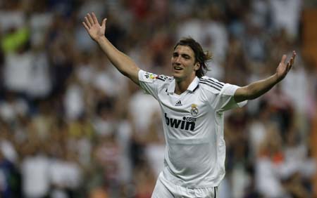Real Madrid's Gonzalo Higuain celebrates his goal against Sporting during their Santiago Bernabeu trophy soccer match at Santiago Bernabeu stadium August 27, 2008. 
