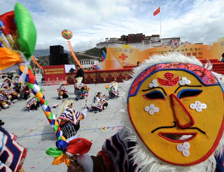 People perform Tibetan drama at the opening ceremony of the Shoton (Yogurt) Festival celebration on the Potala Palace Square in Lhasa, capital of Tibet Autonomous Regional, August 30, 2008. Various activities will be held during the Shoton Festival such as Tangka Paintings display, dancings and Tibetan drama show, etc.