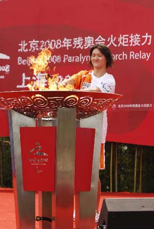 The Paralympic torch was relayed on Monday in Shanghai, the third stop of the flame's 'modern China' route. [Xinhua] 