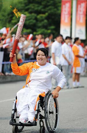 The Paralympic torch was relayed on Monday in Shanghai, the third stop of the flame's 'modern China' route. [Xinhua] 