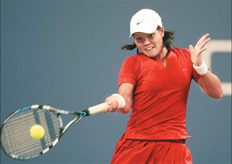 Li Na of China returns a shot to Elena Dementieva of Russia during a US Open fourth round match at the USTA Billie Jean King National Tennis Center on Sunday in New York. Dementieva won 6-4, 6-1. 