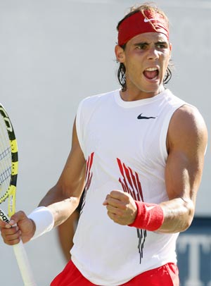 Rafael Nadal of Spain celebrates a score during the 4th round of the men's singles event against Sam Querrey of the United States at the US Open 2008 held in New York, the United States, Sept. 1, 2008. Nadal won the match 3-1 and advanced to the next round. (Xinhua/Hou Jun)