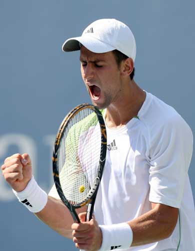 Novak Djokovic of Serbia reacts against Tommy Robredo of Spain during Day 9 of the 2008 U.S. Open at the USTA Billie Jean King National Tennis Center on September 2, 2008 in the Flushing neighborhood of the Queens borough of New York City.