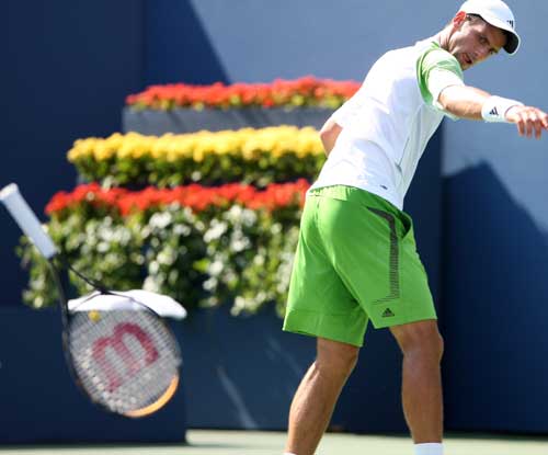 Novak Djokovic of Serbia reacts against Tommy Robredo of Spain during Day 9 of the 2008 U.S. Open at the USTA Billie Jean King National Tennis Center on September 2, 2008 in the Flushing neighborhood of the Queens borough of New York City.