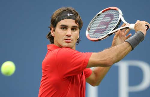 Roger Federer returns a shot against Igor Andreev in the U.S. Open on Tuesday, September 2, 2008, in Flushing Meadows, New York. 