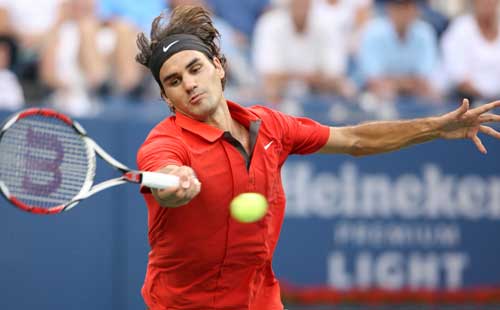 Roger Federer of Switzerland returns to Igor Andreev of Russia during Day 9 of the 2008 U.S. Open at the USTA Billie Jean King National Tennis Center on September 2, 2008 in the Flushing neighborhood of the Queens borough of New York City. 