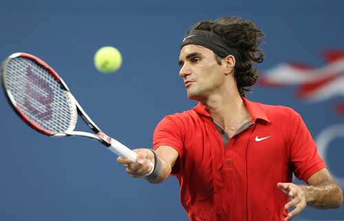 Roger Federer of Switzerland returns to Igor Andreev of Russia during Day 9 of the 2008 U.S. Open at the USTA Billie Jean King National Tennis Center on September 2, 2008 in the Flushing neighborhood of the Queens borough of New York City. 