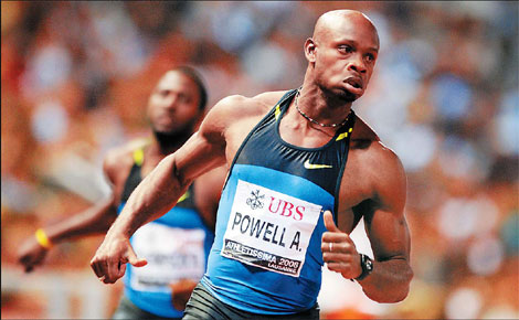 Jamaica's Asafa Powell looks on after winning the men's 100m race and clocking the world's second best time during the athletics IAAF Super Grand Prix Athletissima meeting, on Tuesday at the Olympic stadium in Lausanne. 