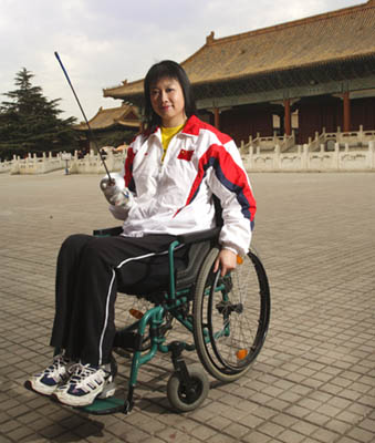 disabled volunteer qi enjoys serving others -- ch