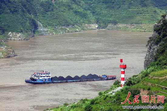 September 1, 2008; a steamship, guided by a navigation light, passes through the Xilingxia section of the Yangtze River in central China's Hubei Province. 
