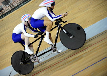 Britain&apos;s Aileen(L) and her pilot Ellen Hunter compete in the final of cylcing track women&apos;s 1km time trial(B&VI) at the Beijing 2008 Paralympic Games in Beijing, Sept 7, 2008. Aileen/Ellen Hunter claimed the title of the event and broke the world record with a time of 1 min 09.066 secs.