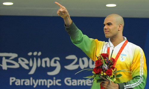 Photos: Andre Brasil of Brazil wins Men's 100m Butterfly S10 gold