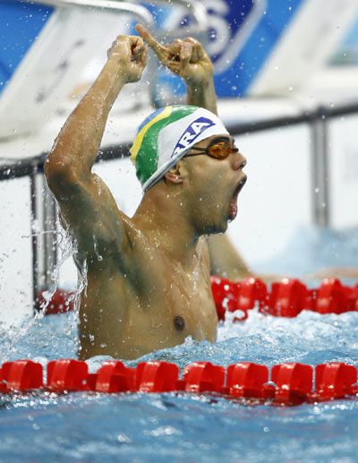 Photos: Andre Brasil of Brazil wins Men's 100m Butterfly S10 gold