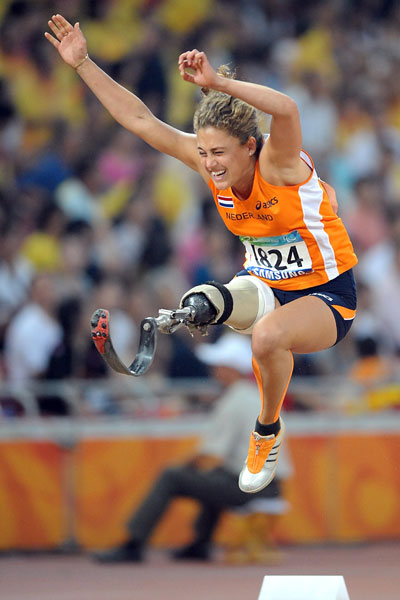 Photos: Christine Wolf of Australia wins Women's Long Jump F42 gold