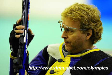 Jonas Jacobsson of Sweden reacts in the men's R1-10m air rifle standing SH1 final of shooting event during Beijing 2008 Paralympic Games in Beijing, Sept. 8, 2008. Jonas Jacobsson won the gold with a total score of 700.5. [Ren Yong/Xinhua] 