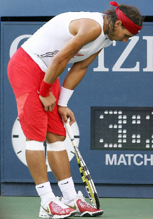 Rafael Nadal of Spain reacts after losing a point to Andy Murray of Britain during the conclusion of their rain delayed semi-final match at the U.S. Open tennis tournament at Flushing Meadows in New York September 7, 2008. Murray won 6-2, 7-6 (7/5), 4-6, 6-4. 