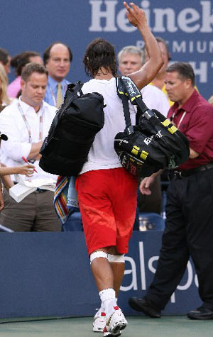 Rafael Nadal of Spain leaves the court after the semi-final match at the U.S. Open tennis tournament at Flushing Meadows in New York September 7, 2008.