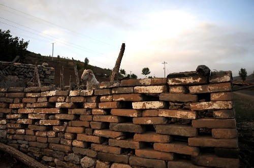 In the picture taken on June 1, 2008 is a sheepfold built with the bricks of the relics of the Great Wall located in the Beibao Village, Qingshuihe County of Inner Mongolia Autonomous Region.