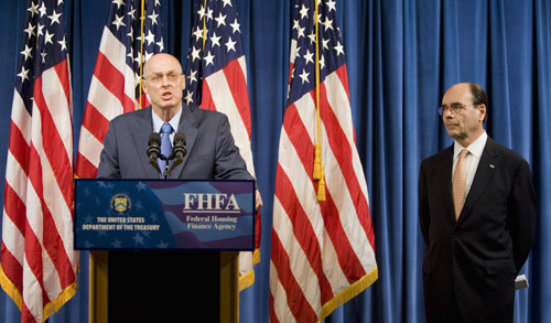 US Secretary of the Treasury Henry Paulson (L) and Jim Lockhart, Director of the the new independent regulator, the Federal Finanace Agency (FHFA), announce that the government is taking control of mortgage finance companies Fannie Mae and Freddie Mac during a news conference at the Office of Management Supervision in Washington, DC, September 7, 2008. [Xinhua]