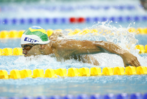 Photos: Andre Brasil of Brazil wins Men's 100m Butterfly S10 gold