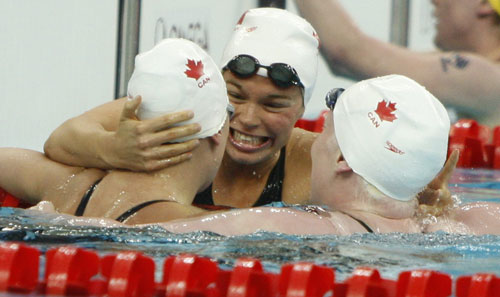 Valerie Grand Maison (C) of Canada won the gold medal in the S8 final of Women's 100m Butterfly.