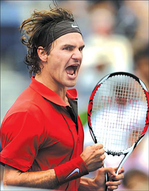 Roger Federer of Switzerland wins the third set during his semifinal match against Novak Djokovic of Serbia at the US Open tennis tournament in New York on Saturday. Federer won 6-3, 5-7, 7-5, 6-2. 