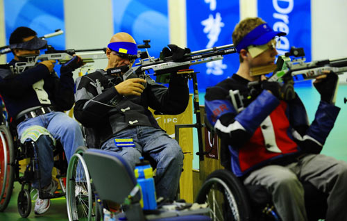 Athletes compete for the Men's R1-10m Air Rifle Standing SH1 with a total score of 700.5 points during the Beijing 2008 Paralympic Games in Beijing on September 8, 2008.