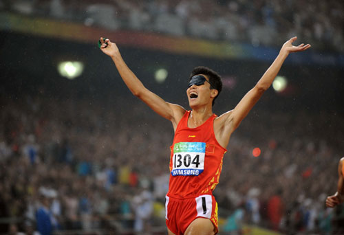 Photos: China's Zhang Zhen wins Men's 5000m - T11 gold