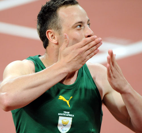 Photos: Oscar Pistorius of South Africa wins Men's 100m - T44 gold