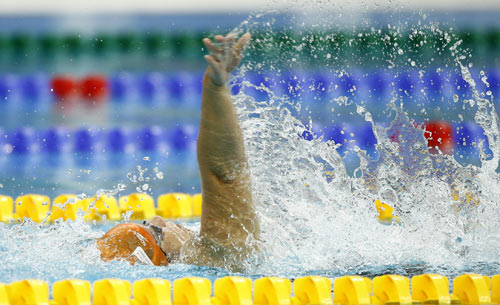 Photos: Dutch Mirjam de Koning-Peper claims the title of Women's 100m Backstroke S6 Swimming event