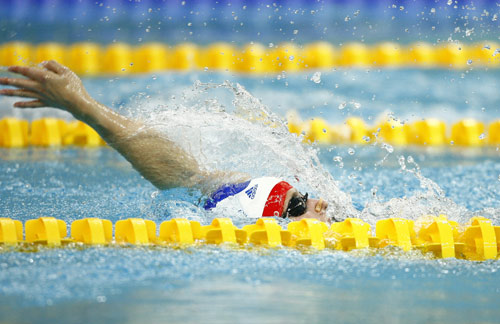 Photos: Dutch Mirjam de Koning-Peper claims the title of Women's 100m Backstroke S6 Swimming event