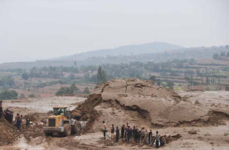Eight more deaths were reported Tuesday morning in north China's Shanxi Province, bringing the death toll from the rain-triggered mud-rock flow that caused the collapse of a warehouse to 34, the local rescue headquarters said on Tuesday. 