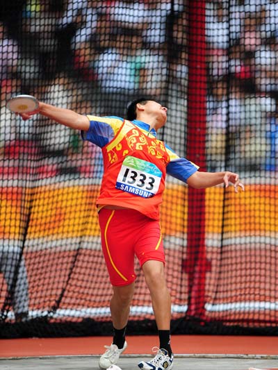 China's Wu Qing claimed the Women's Discus Throw F35/36 gold medal with a result of 25.80 meters in the Beijing 2008 Paralympic Games at the National Stadium, also known as the Bird's Nest, in Beijing on September 9, 2008.