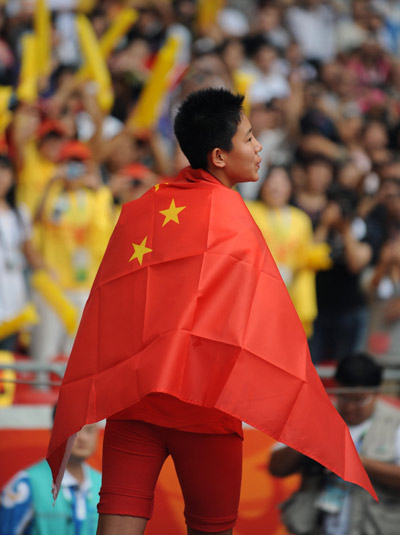 China's Wu Qing claimed the Women's Discus Throw F35/36 gold medal with a result of 25.80 meters in the Beijing 2008 Paralympic Games at the National Stadium, also known as the Bird's Nest, in Beijing on September 9, 2008.