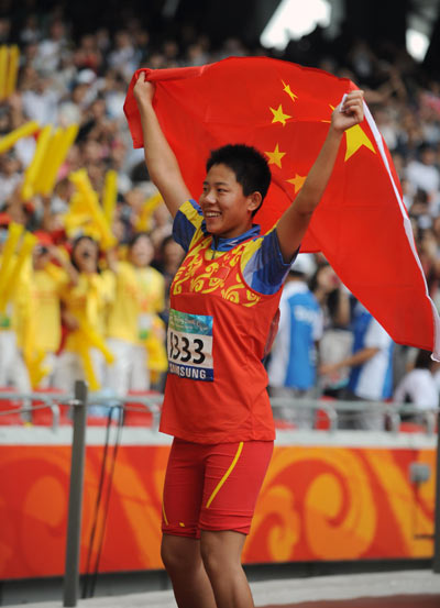 China's Wu Qing claimed the Women's Discus Throw F35/36 gold medal with a result of 25.80 meters in the Beijing 2008 Paralympic Games at the National Stadium, also known as the Bird's Nest, in Beijing on September 9, 2008. 