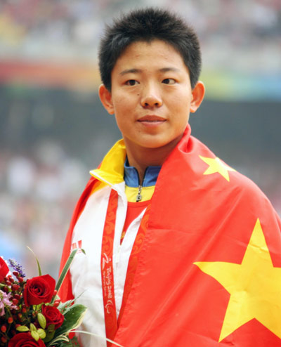 China's Wu Qing claimed the Women's Discus Throw F35/36 gold medal with a result of 25.80 meters in the Beijing 2008 Paralympic Games at the National Stadium, also known as the Bird's Nest, in Beijing on September 9, 2008. 