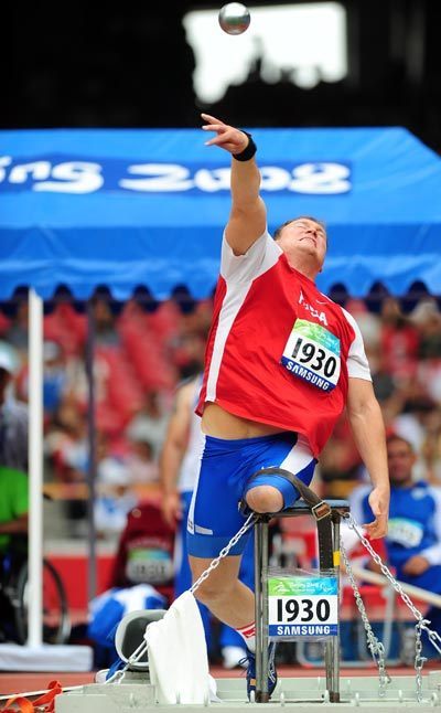 Russia's Alexey Ashapatov set a new world record and claimed the Men's Shot Put F57/58 gold medal with a result 16.03 meters at the National Stadium, also known as the Bird's Nest, in Beijing on September 9, 2008.