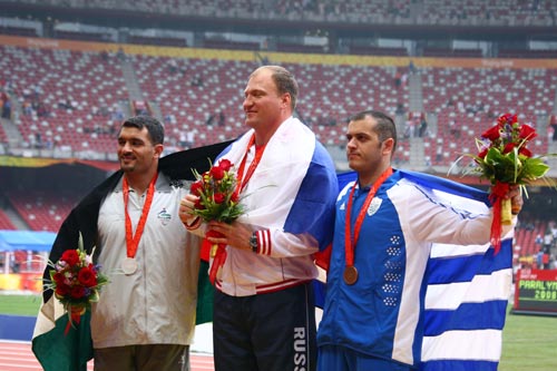 Medalists of Men's Shot Put F57/58 stand on the podium at the National Stadium, also known as the Bird's Nest, in Beijing on September 9, 2008. 